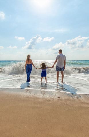 Happy family at the beach